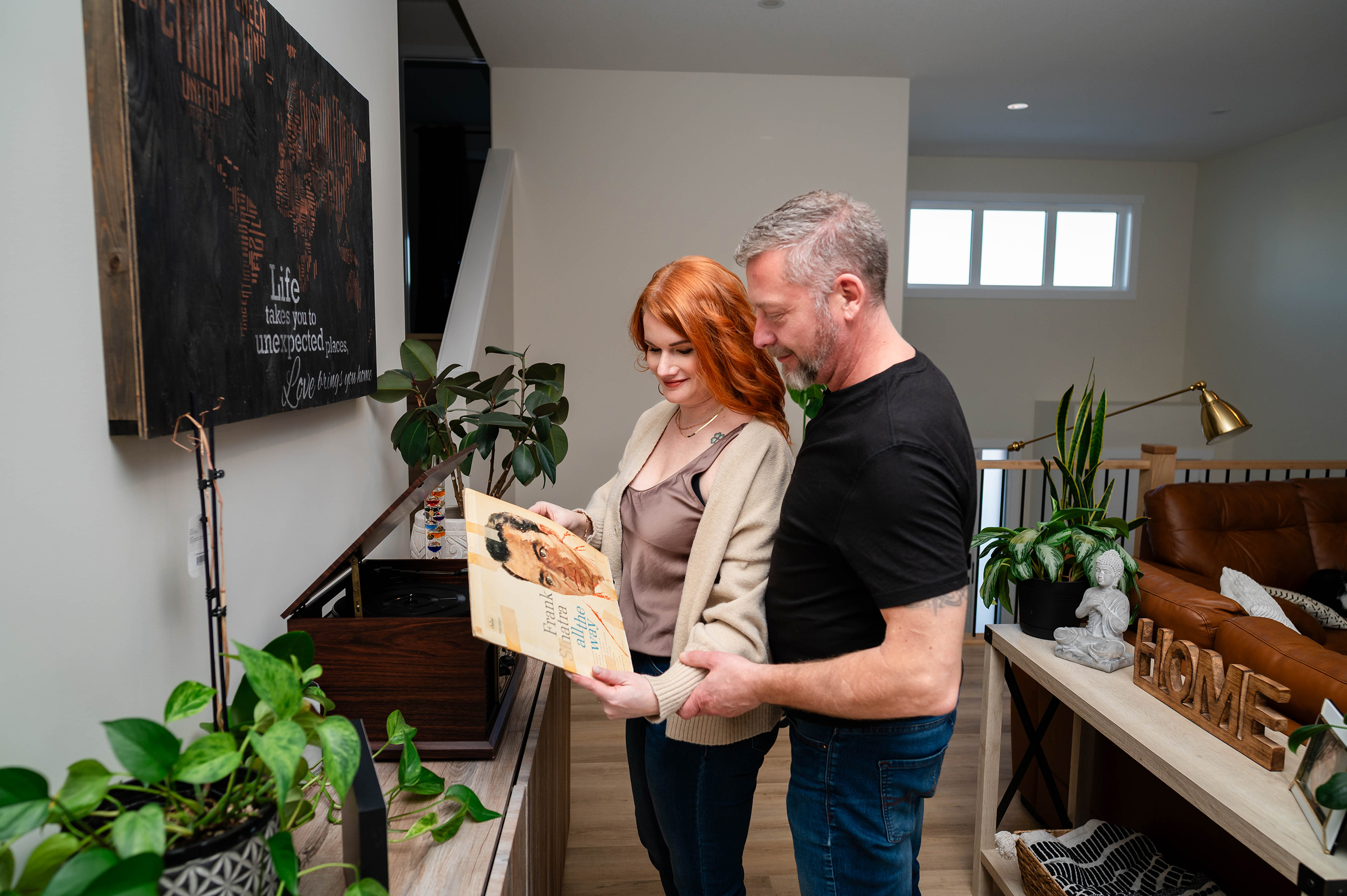 Engagement Photos, Indoor Photos, Lifestyle Photographer, Photographer near me, Kitchen, Modern kitchen, newly engaged, yeg photographer, frank Sinatra, old record player, 