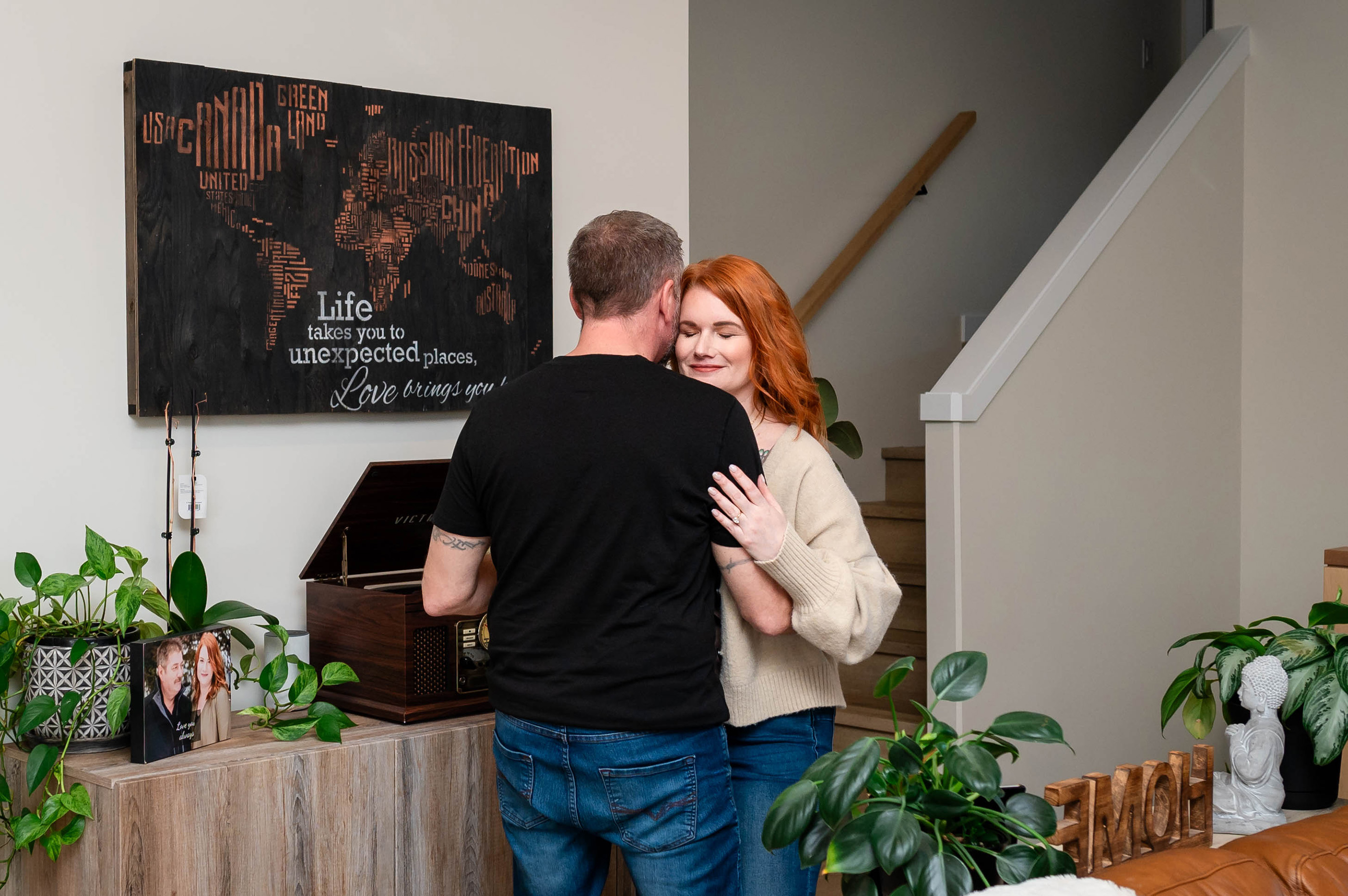 Engagement Photos, Indoor Photos, Lifestyle Photographer, Photographer near me, Kitchen, Modern kitchen, newly engaged, yeg photographer, frank Sinatra, old record player,  dancing together